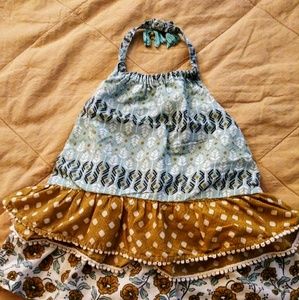 Cute blouse & short/skirt set.